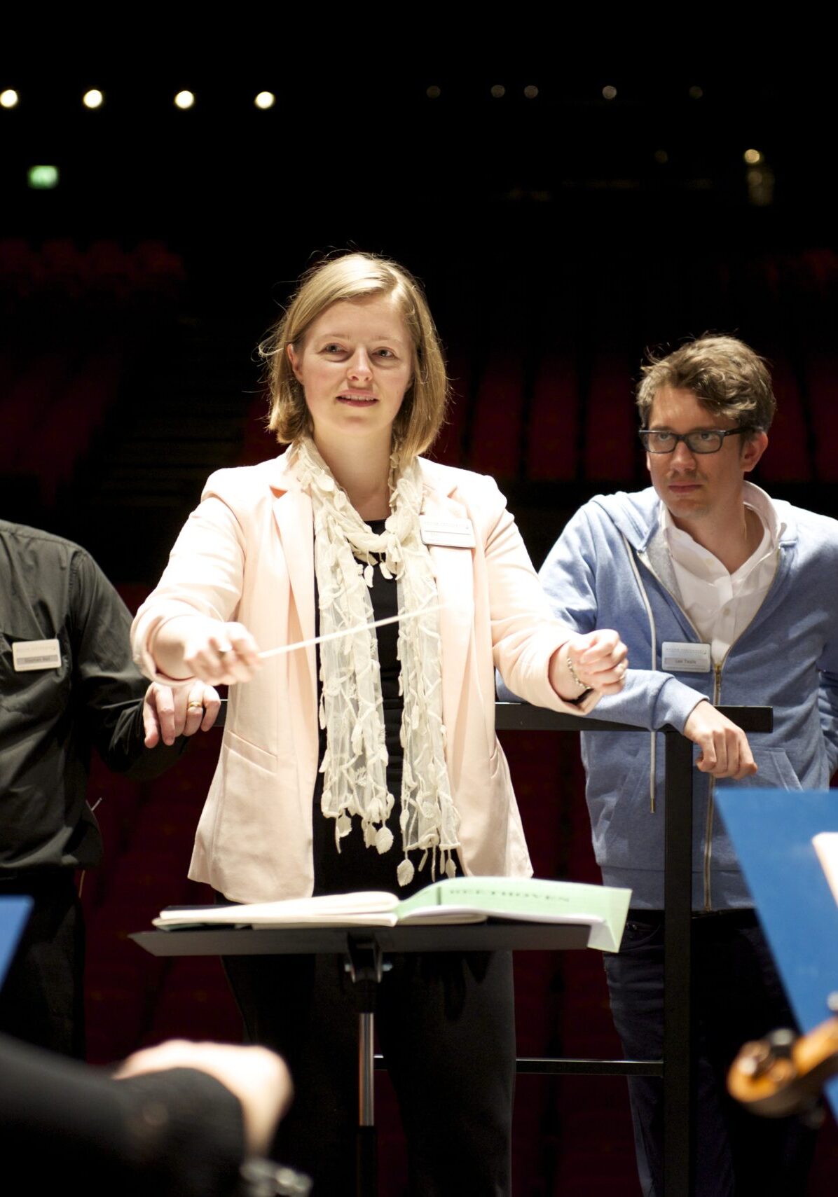 Woman conducting